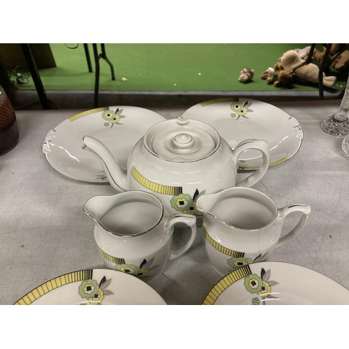 1172 - A CZECHOSLOVAKIAN PART RETRO TEASET TO INCLUDE A TEAPOT, CREAM JUGS, CAKE PLATES, SIDE PLATES AND SA... 