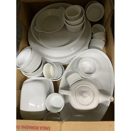 1179 - A GROUP OF WHITE CERAMIC DINNERWARE