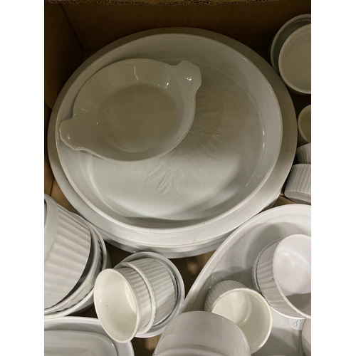 1179 - A GROUP OF WHITE CERAMIC DINNERWARE