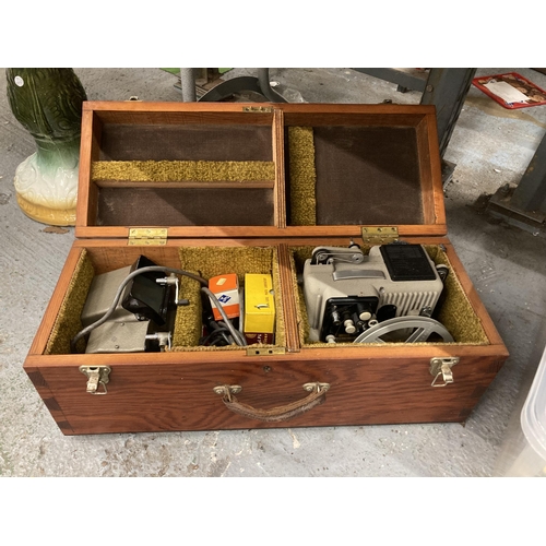 1191 - A CINE CAMERA IN A WOODEN CARRY BOX