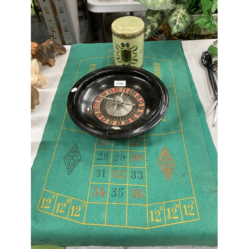 1196 - A ROULETTE WHEEL WITH FELT AND CHIPS