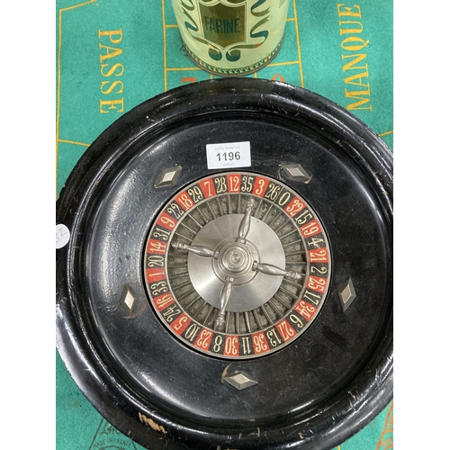 1196 - A ROULETTE WHEEL WITH FELT AND CHIPS