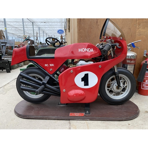 1504 - A HONDA RC166 MODEL FAIRGROUND RIDE MOUNTED ON A WOODEN PLINTH