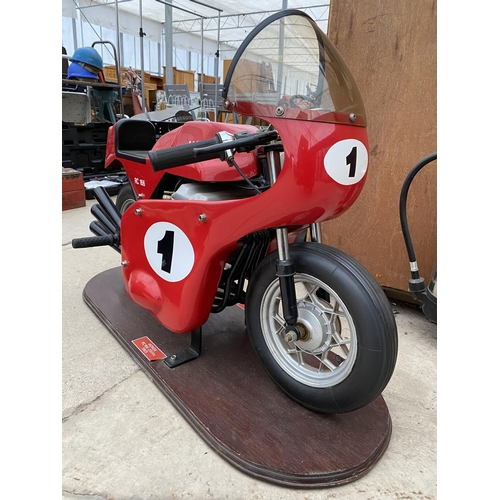 1504 - A HONDA RC166 MODEL FAIRGROUND RIDE MOUNTED ON A WOODEN PLINTH