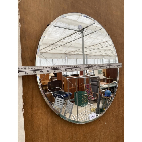 1512 - A CIRCULAR ART DECO STYLE BEVELED EDGE WALL MIRROR