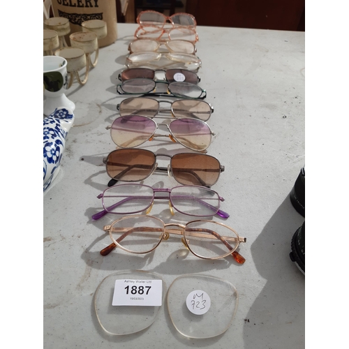 1887 - AN ASSORTMENT OF GLASSES AND SUN GLASSES ETC