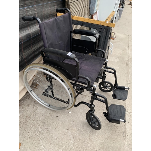 2003 - A FOLDING WHEEL CHAIR