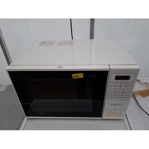 2355 - A WHITE AND BLACK HINARI LIFESTYKE MICROWAVE OVEN