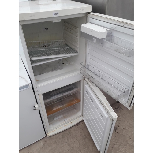 2359 - A WHITE PROLINR UPRIGHT FRIDGE FREEZER