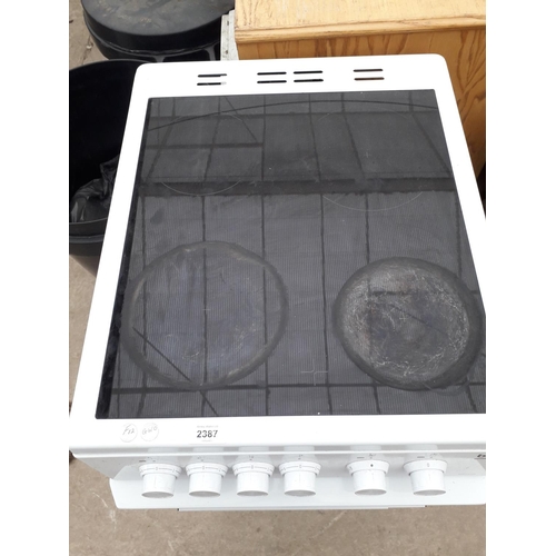 2387 - A WHITE BEKO FREESTANDING ELECTRIC OVEN AND HOB BELIEVED WORKING BUT NO WARRANTY