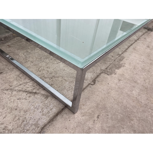 2540 - A MODERNIST LOW COFFEE TABLE ON POLISHED FROSTED GLASS TOP, 55X26