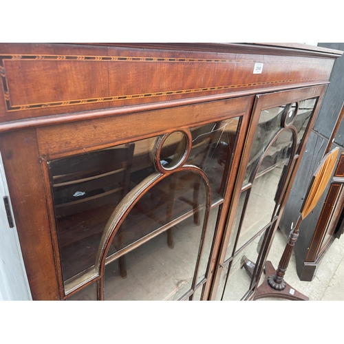 2548 - A 19TH CENTURY MAHOGANY AND INLAID TWO DOOR GLAZED BOOKCASE ON BRACKET FEET, 43.5