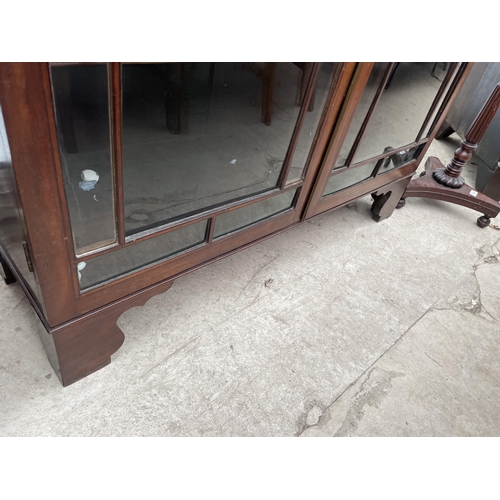 2548 - A 19TH CENTURY MAHOGANY AND INLAID TWO DOOR GLAZED BOOKCASE ON BRACKET FEET, 43.5