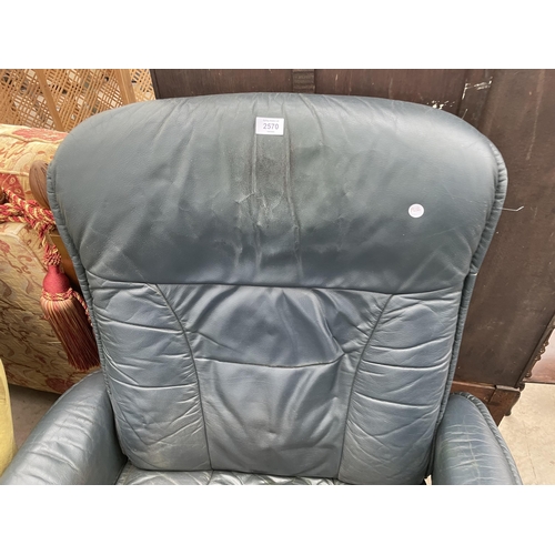 2570 - A STRESSLESS 'EKORNES' ADJUSTABLE SWIVEL CHAIR WITH MATCHING STOOL