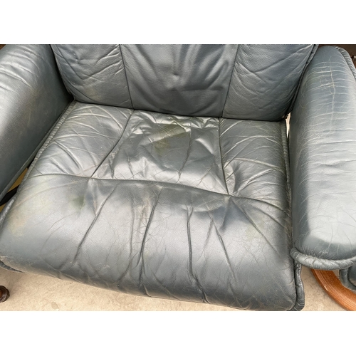 2570 - A STRESSLESS 'EKORNES' ADJUSTABLE SWIVEL CHAIR WITH MATCHING STOOL