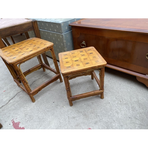 2669 - A MODERN OTTOMAN, DRESSING STOOL, YEW WOOD TV STAND AND NEST OF TWO BAMBOO TABLES