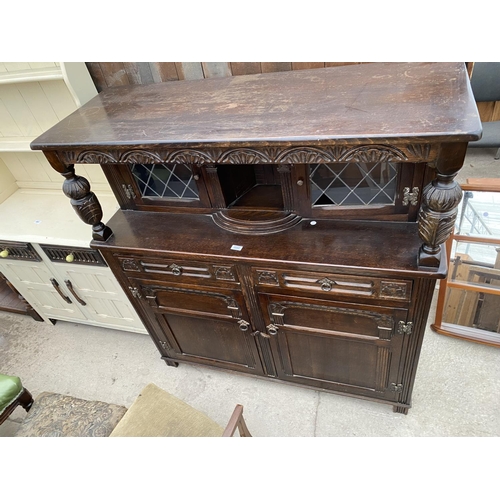 2682 - A REPRODUCTION OAK COURT CUPBOARD WITH GLAZED AND LEADED UPPER PORTION, 50