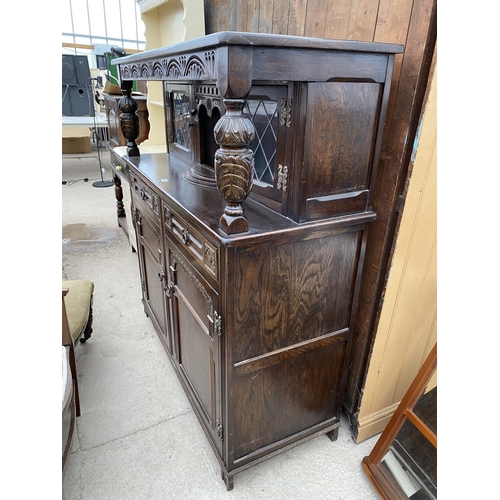 2682 - A REPRODUCTION OAK COURT CUPBOARD WITH GLAZED AND LEADED UPPER PORTION, 50