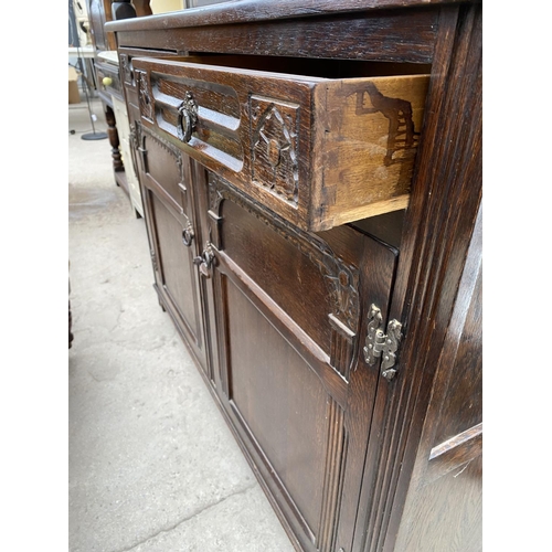 2682 - A REPRODUCTION OAK COURT CUPBOARD WITH GLAZED AND LEADED UPPER PORTION, 50