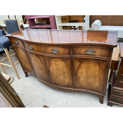 2711 - A MAHOGANY AND CROSSBANDED 'REPRODUX' SERPENTINE FRONTED SIDEBOARD, 60