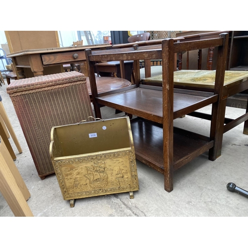 2719 - A LLOYD LOOM LINEN BOX, EMBOSSED BRASS MAGAZINE RACK AND THREE TIER TROLLEY