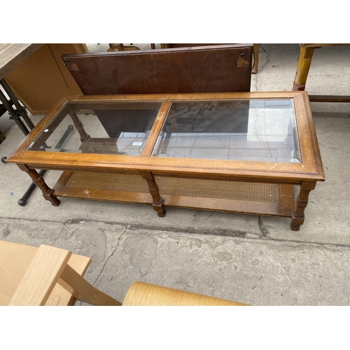 2721 - A HARDWOOD AND WICKER COFFEE TABLE WITH INSET GLASS TOP, 51 X 21