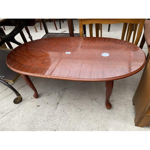 2776 - AN OVULAR COFFEE TABLE ON CABRIOLE LEGS