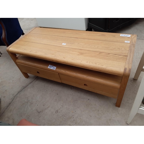 2825 - A 'HABITAT RADIUS' OAK TV UNIT WITH TWO DRAWERS TO THE BASE, 49X21