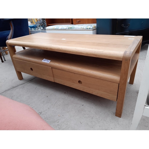 2825 - A 'HABITAT RADIUS' OAK TV UNIT WITH TWO DRAWERS TO THE BASE, 49X21