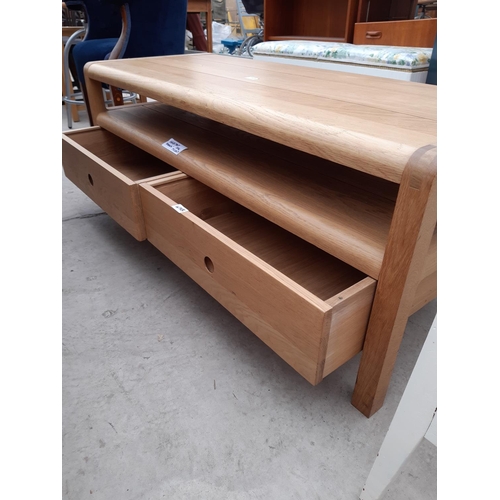 2825 - A 'HABITAT RADIUS' OAK TV UNIT WITH TWO DRAWERS TO THE BASE, 49X21