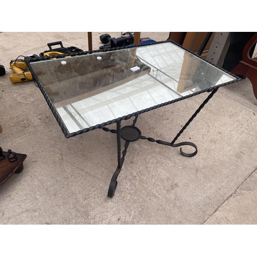 2841 - A WROUGHT IRON COFFEE TABLE WITH INSET MIRRORED TOP, 29X18