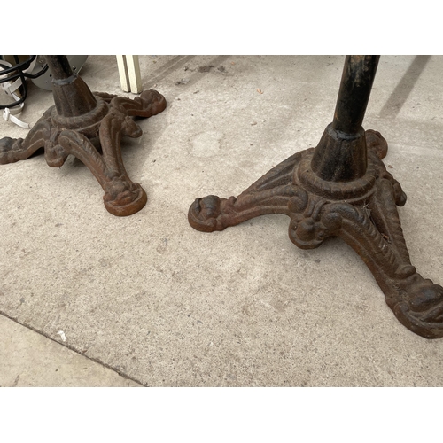 2869A - TWO VINTAGE STOOLS WITH CAST IRON BASES