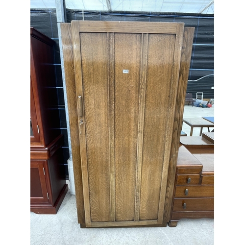 2925 - A MID 20TH CENTURY OAK 'LEBUS' DRESSING CHEST AND TWO DOOR WARDROBE