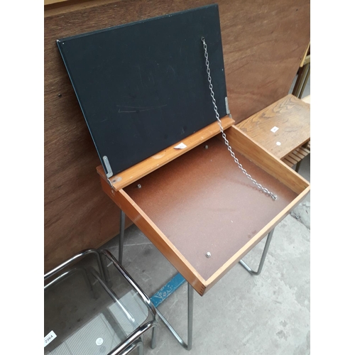 2963 - A MODERN CHILDS DESK ON A TUBULAR FRAME