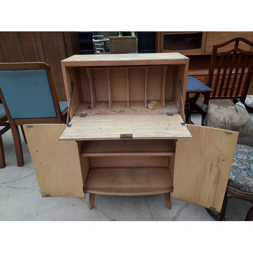 2976 - A MID 20TH CENTURY HARDWOOD BUREAU WITH CUPBOARD TO BASE 24