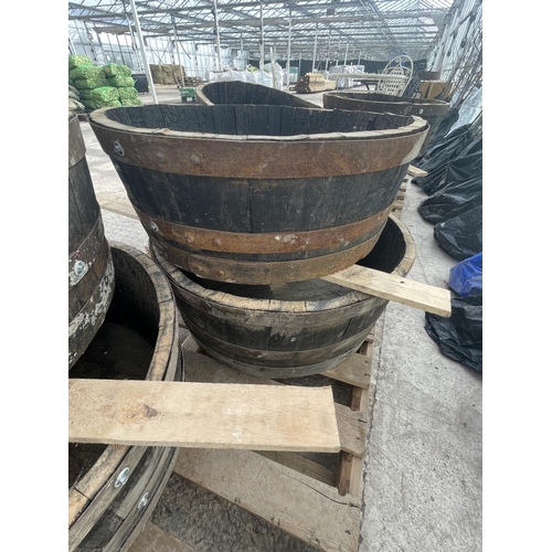 84 - TWO HALF BARREL PLANTERS NO VAT