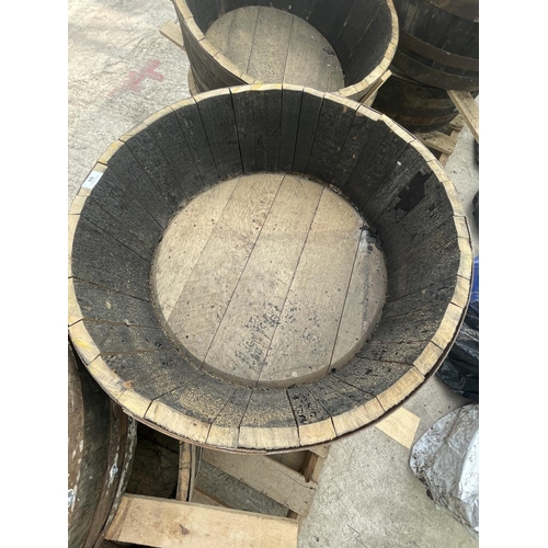 84 - TWO HALF BARREL PLANTERS NO VAT