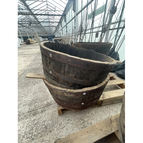 85 - TWO HALF BARREL PLANTERS NO VAT