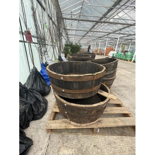 86 - TWO HALF BARREL PLANTERS NO VAT