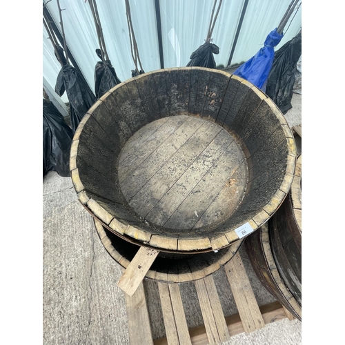 86 - TWO HALF BARREL PLANTERS NO VAT