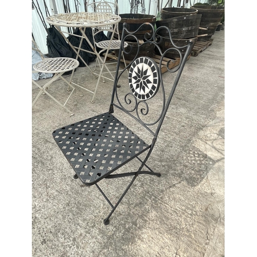 88 - A ROUND TILE TOP BISTRO TABLE AND TWO FOLDING CHAIRS WITH TILED BACKS (ONE CHAIR HAS A STRETCHER A/F... 