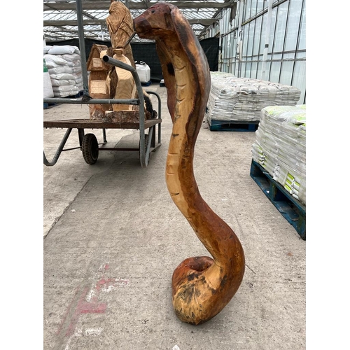 234 - A CARVED WOODEN SNAKE APPROX 107CM HIGH NO VAT