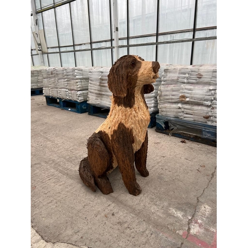 237 - A CARVED WOODEN BROWN & WHITE DOG APPROX 70 CM HIGH NO VAT