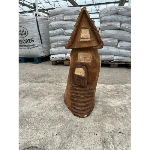 241 - A CARVED WOODEN COTTAGE APPROX 84 CM HIGH NO VAT