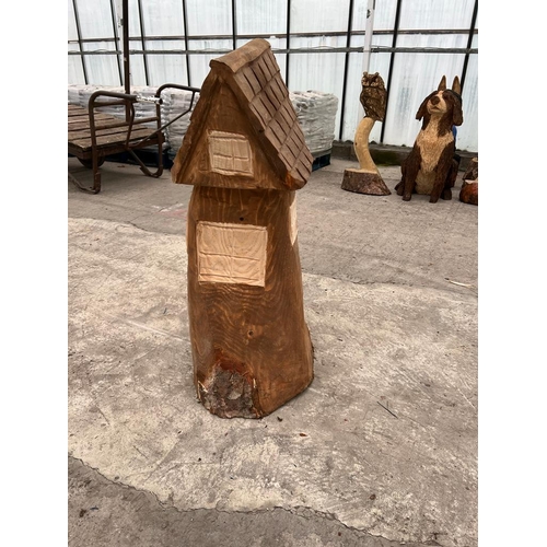 241 - A CARVED WOODEN COTTAGE APPROX 84 CM HIGH NO VAT