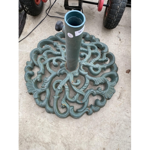 A HEAVY CAST IRON PARASOL BASE