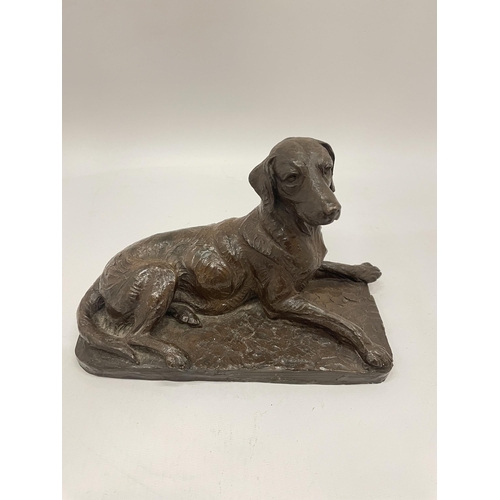 13 - A DORIS LINDNER BRONZED RESIN MODEL OF A SEATED DOG, SIGNED TO REVERSE, LENGTH 20CM