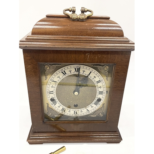 14 - A MAHOGANY ELLIOTT 8-DAY WESTMINSTER CHIMING BRACKET / MANTLE CLOCK WITH KEY