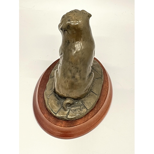 19 - A DOUGLAS GRAY BRONZE EFFECT MODEL OF A PUG ON WOODEN BASE, SIGNED TO REVERSE