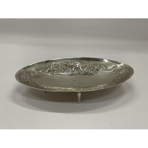 2 - AN ABSTRACT STERLING SILVER OVAL DISH ON NEEDLE FEET, STAMPED TO REVERSE AND DATED CALCUTTA, DECEMBE... 